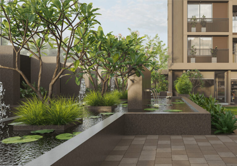 Modern residential apartments of Savera Prarambh in Ghuma, Ahmedabad, showcasing elegant architecture and green surroundings.